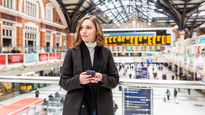 Woman waiting in train station