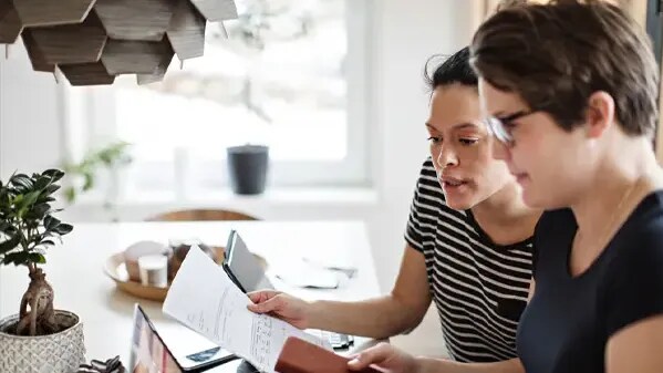 woman looking at laptop screen