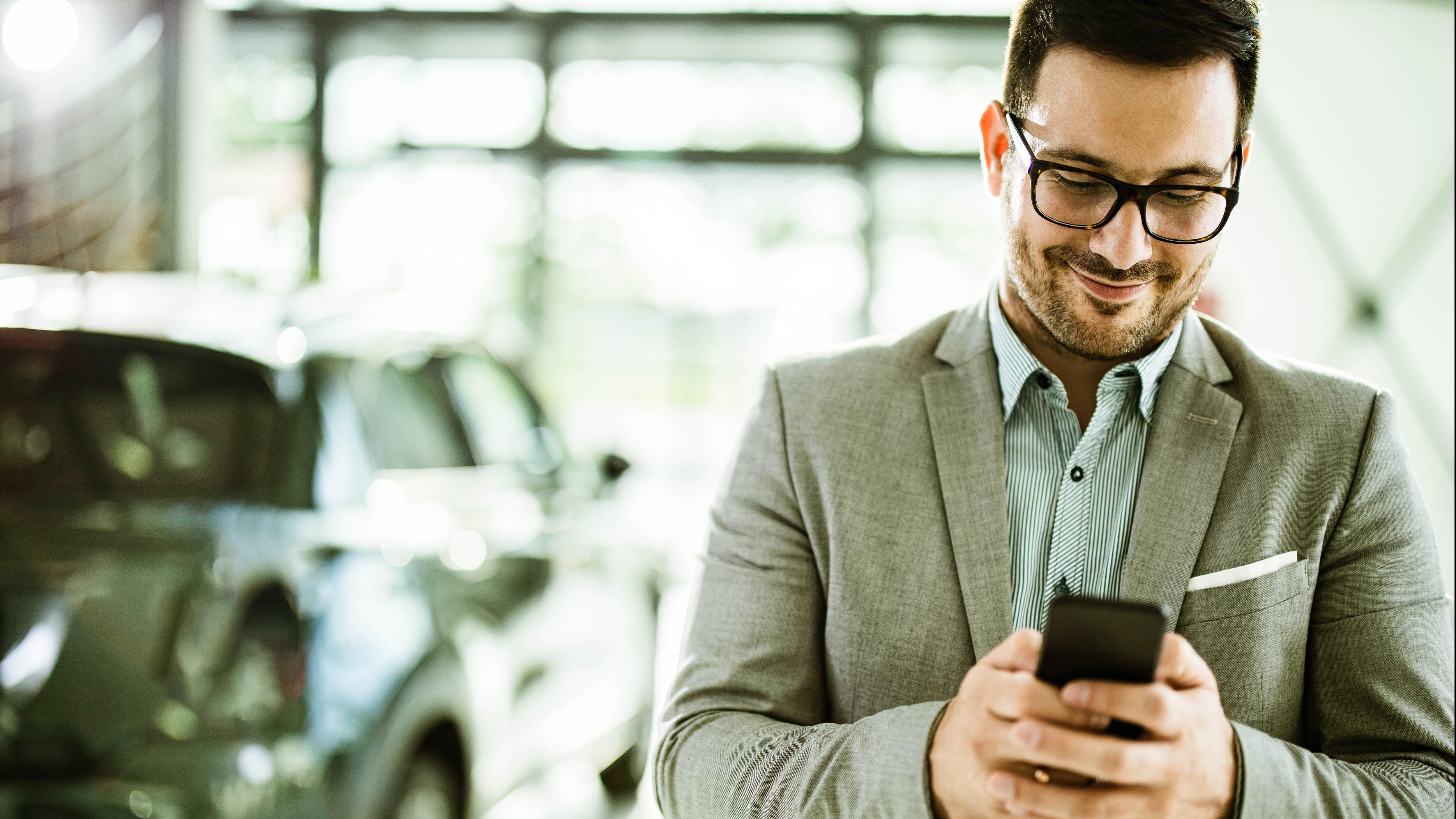 man using app on his phone for travel