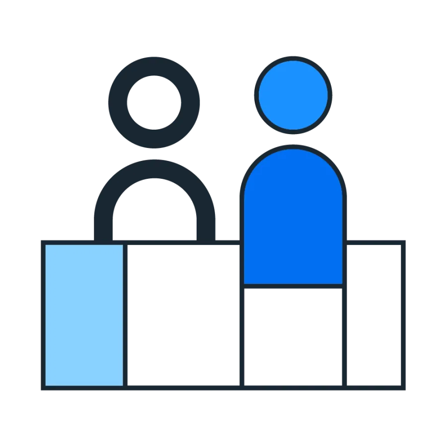two people at a table talking